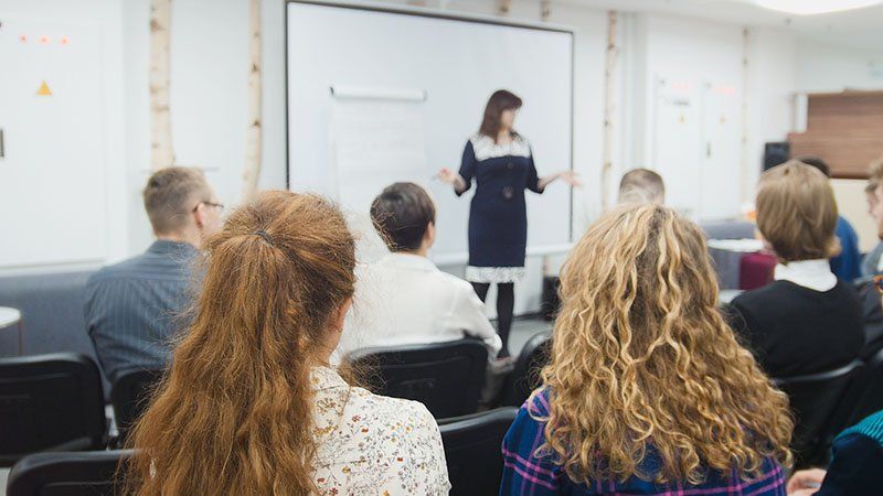 Business woman - speaker at seminar