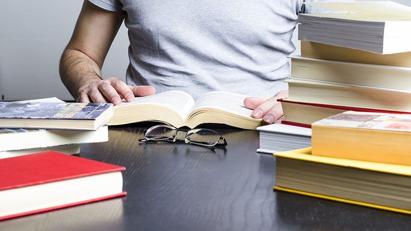 female with books