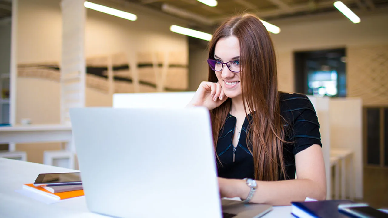 Woman taking a virtual training course in the office